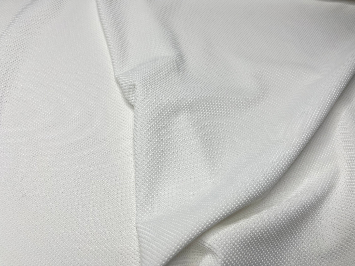 White Color knitted And Jacquard Fabric (Width 58 Inches)