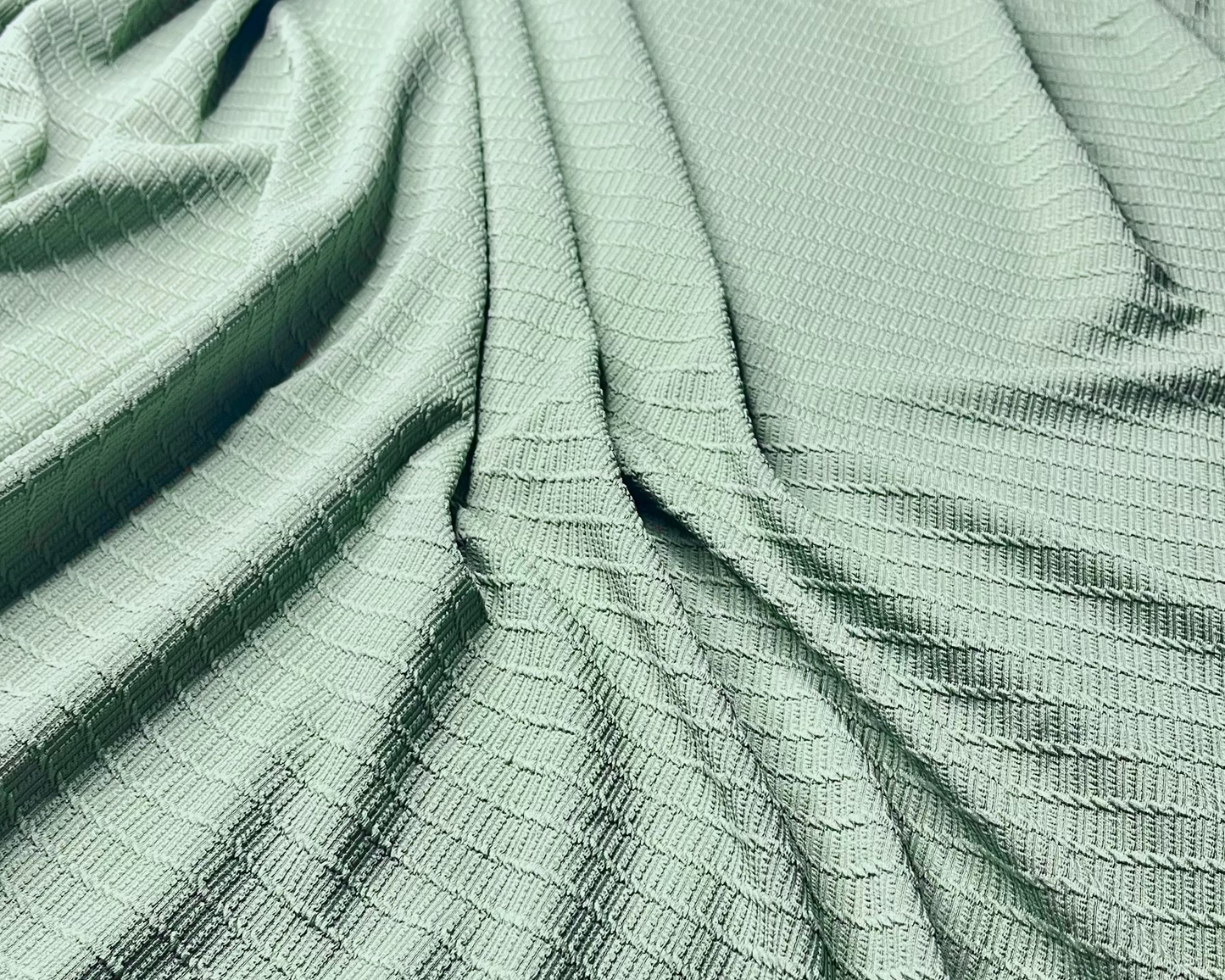 Light Green Color knitted And Jacquard Fabric (Width 58 Inches)