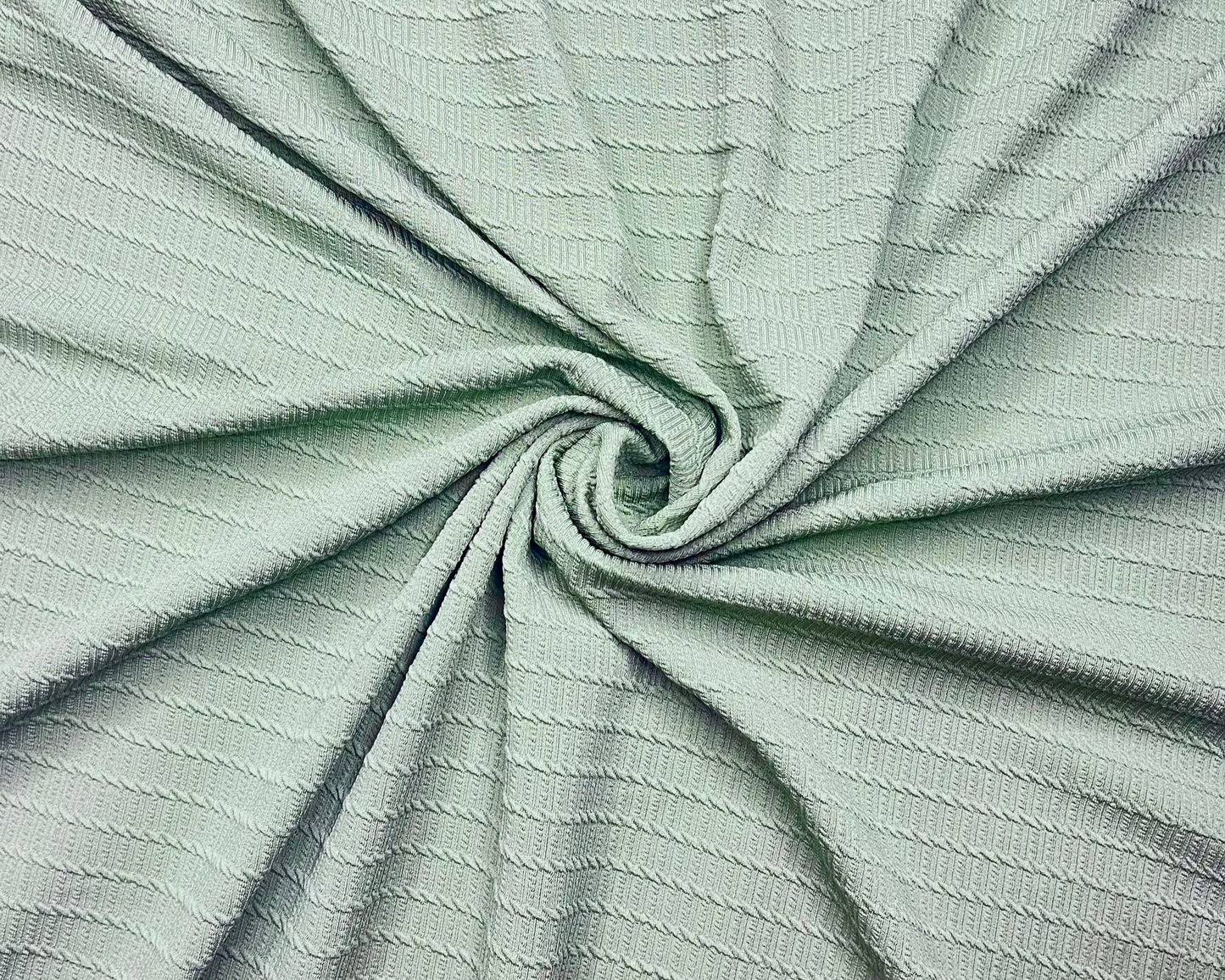 Light Green Color knitted And Jacquard Fabric (Width 58 Inches)